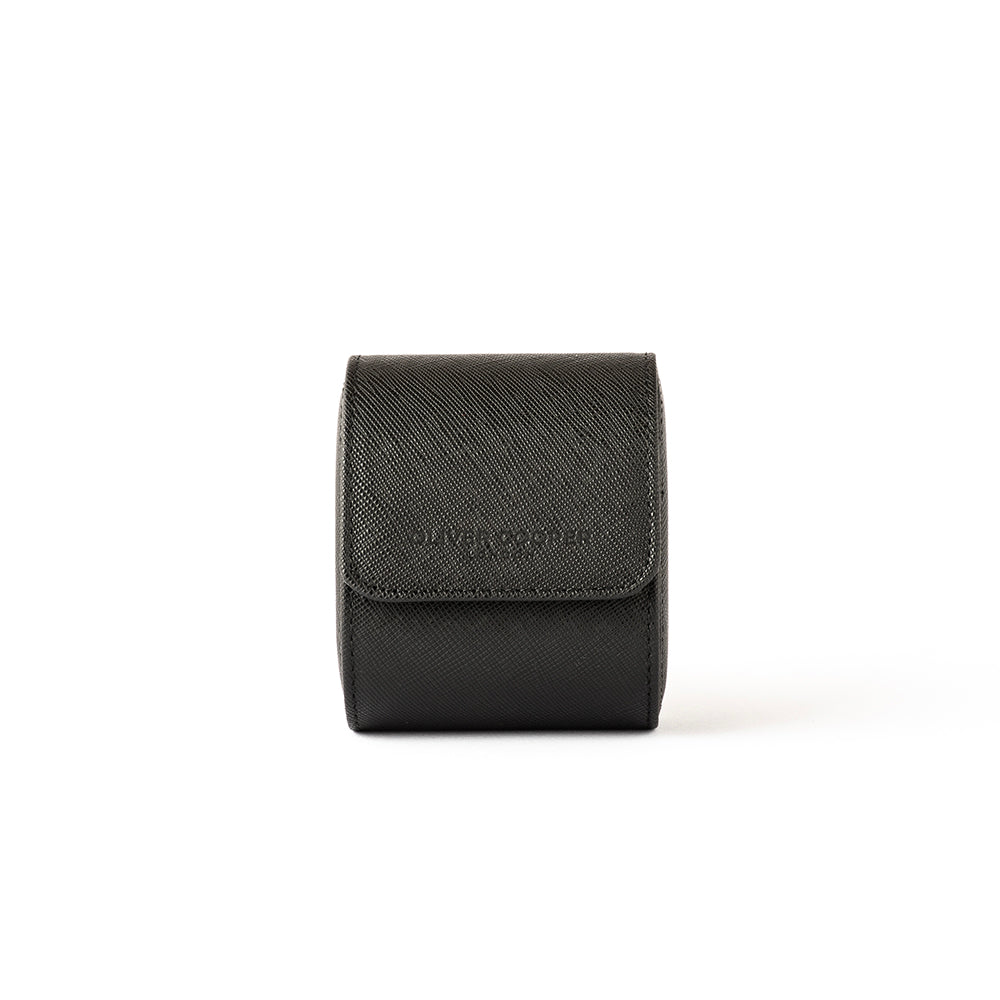 Black single watch storage case crafted from genuine leather with a suede interior.