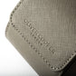 Close up view of grey saffiano leather branded with Oliver Cooper.